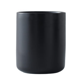 LATCHHOOK utensil holder on countertop keeps utensils organized and within reach while cooking.