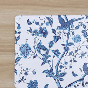 Set of four Laura Ashley cork placemats laid on dining table