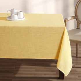 Laura Ashley Harper tablecloth wrinkle-resistant finish on a formal dining table.