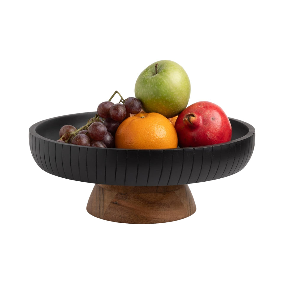 LAVAUK mango wood fruit bowl with pedestal as a centerpiece on a dark surface