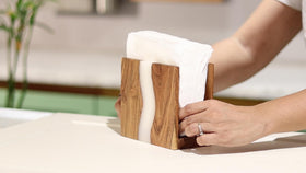LAVAUK indoor and outdoor napkin dispenser for versatile table use.