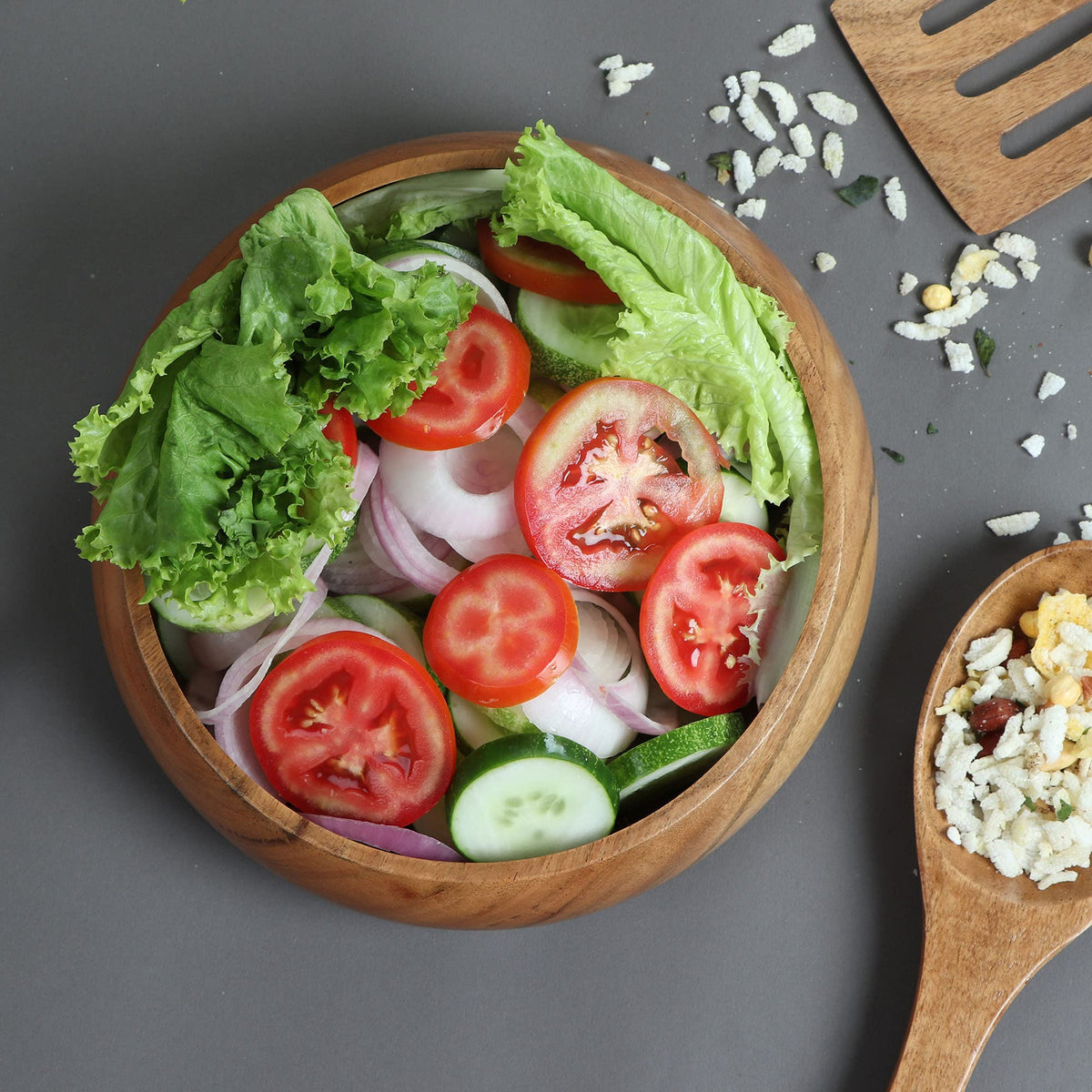 LAVAUX DESIGNS acacia bowl enhances fine dining and entertaining experiences.
