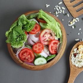 LAVAUX DESIGNS acacia bowl enhances fine dining and entertaining experiences.