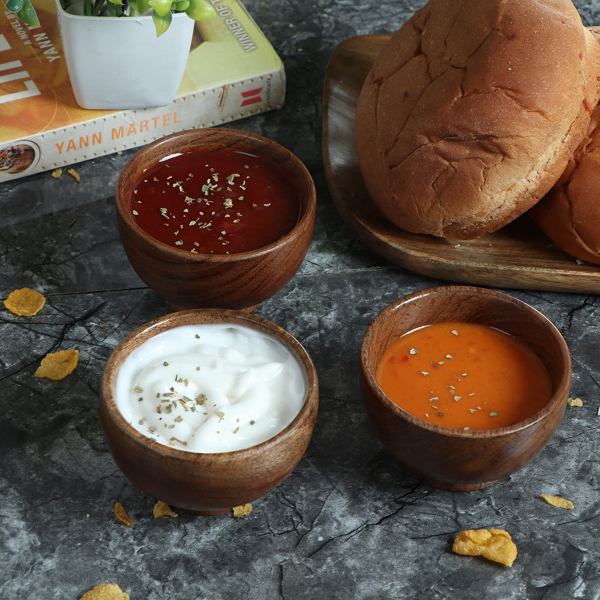 Lavaux Designs acacia bowls on a charcuterie board for cheese accents.