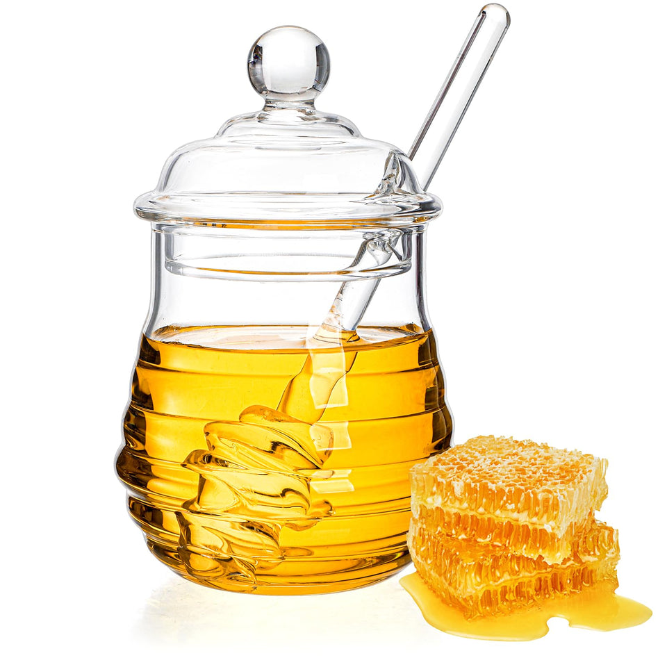 Lawei glass honey jar with dipper offers a clear view of honey and elegant design.
