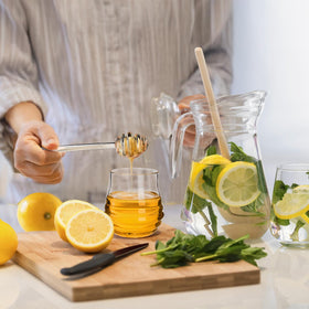 Lawei 10oz honey jar capacity fits a generous amount of honey or syrup.