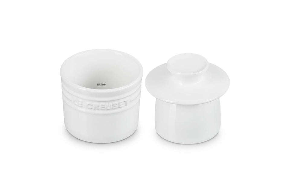 Le Creuset butter crock with lid inverted in water to seal freshness