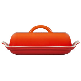Le Creuset Heritage Flame butter dish, dishwasher-safe for simple cleanup.