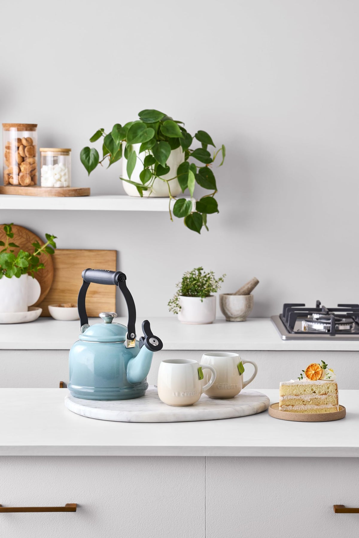 Le Creuset Demi Tea Kettle Sea Salt side profile with enamel finish