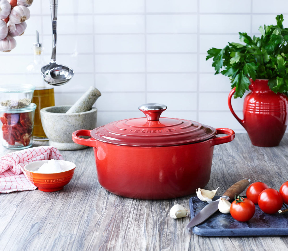 Cerise lid from Le Creuset Dutch oven circulates steam to lock moisture