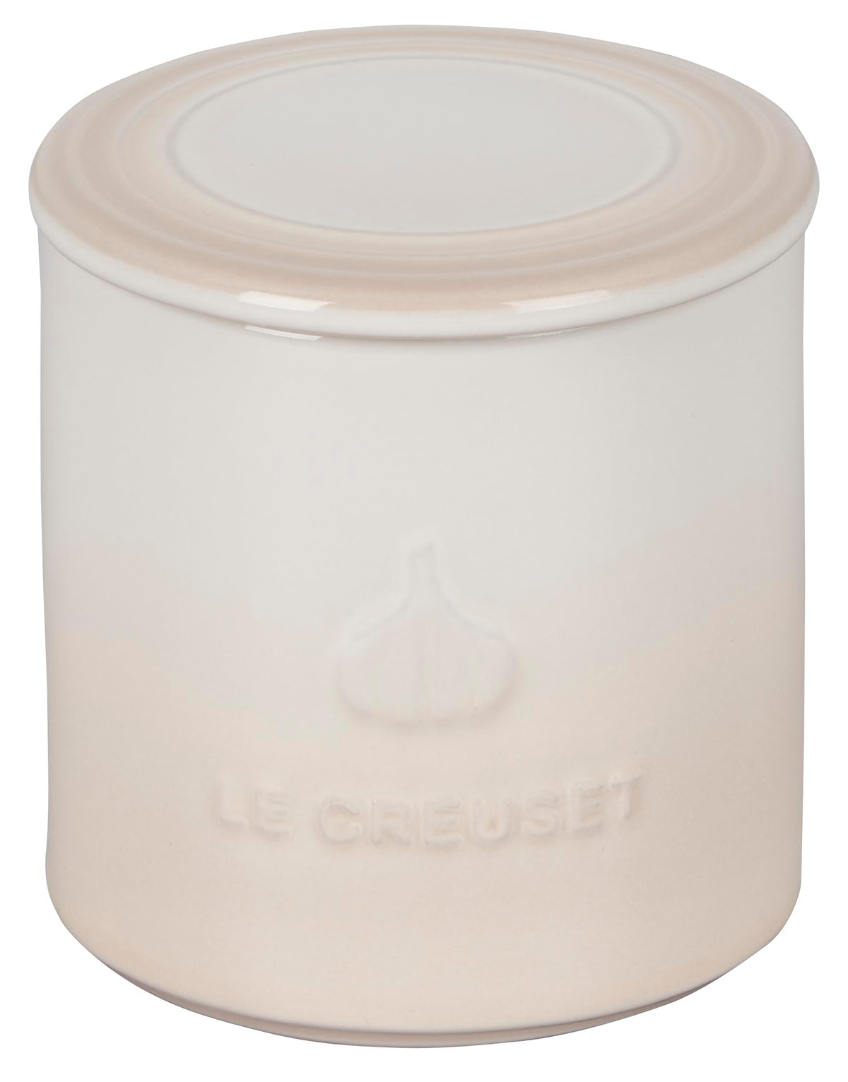 Le Creuset garlic keeper meringue on counter for easy garlic storage.