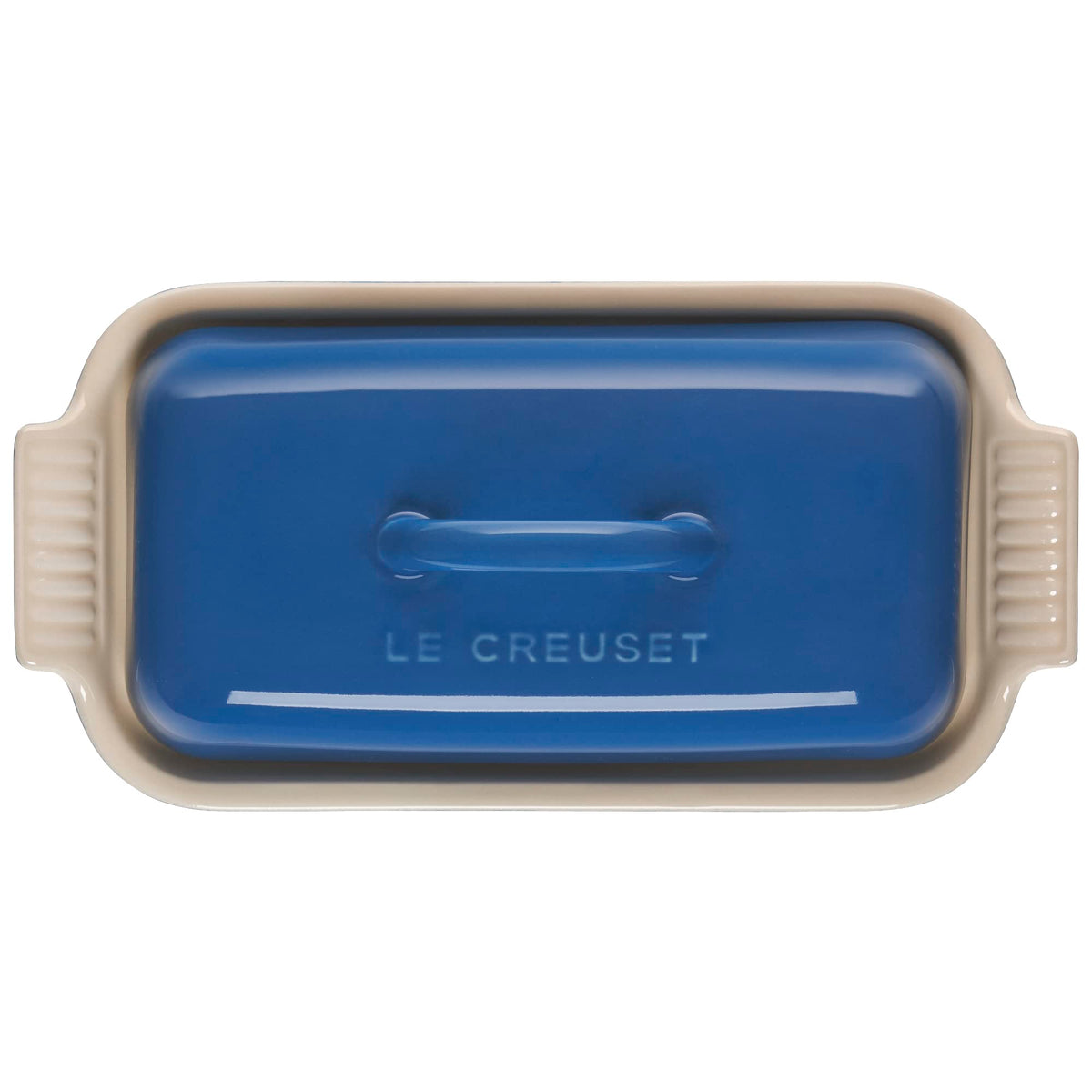 Le Creuset Heritage Butter Dish in use, safe for microwave and dishwasher.