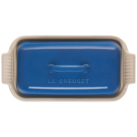 Le Creuset Heritage Butter Dish in use, safe for microwave and dishwasher.