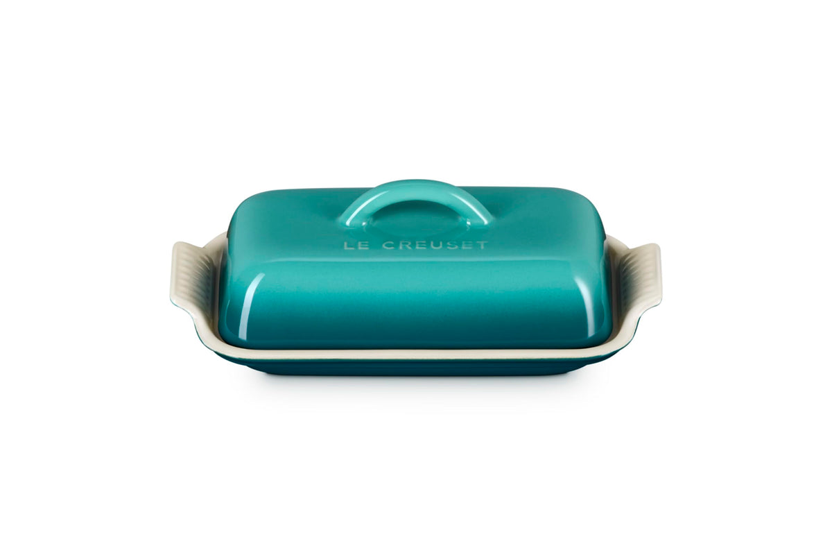 Le Creuset Heritage Butter Dish Riviera top view showcases vibrant glaze and sturdy finish.