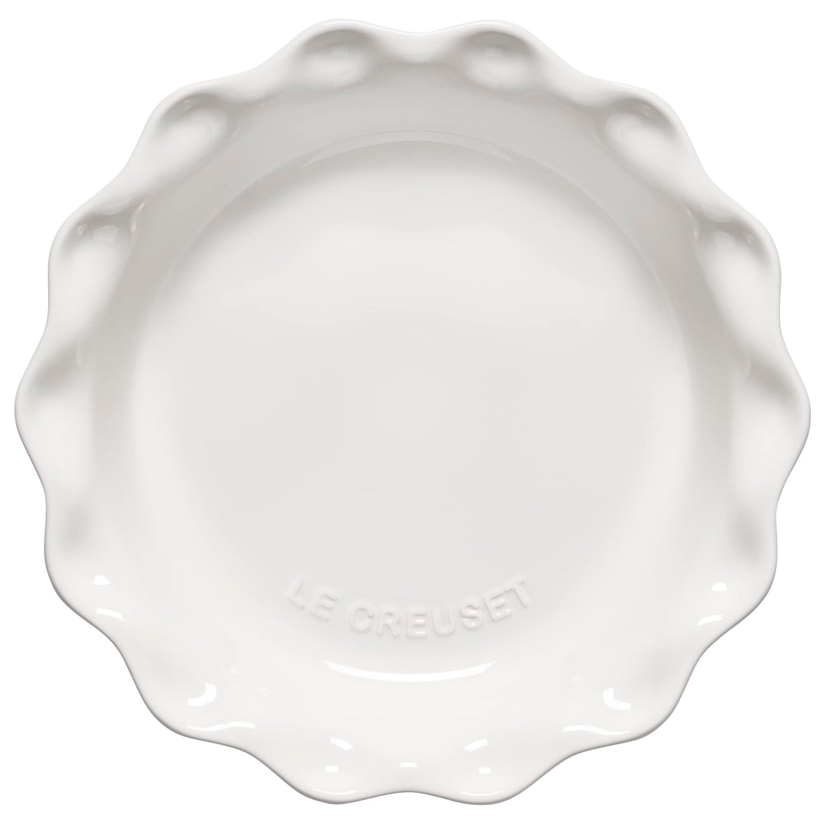 Le Creuset Heritage Pie Dish on table for oven-to-table presentation and glaze.