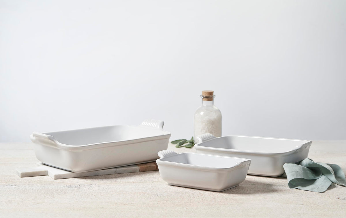 Le Creuset Heritage 10-inch oyster rectangular dish for roasting vegetables and keeping warmth.