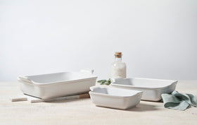 Le Creuset Heritage 10-inch oyster rectangular dish for roasting vegetables and keeping warmth.