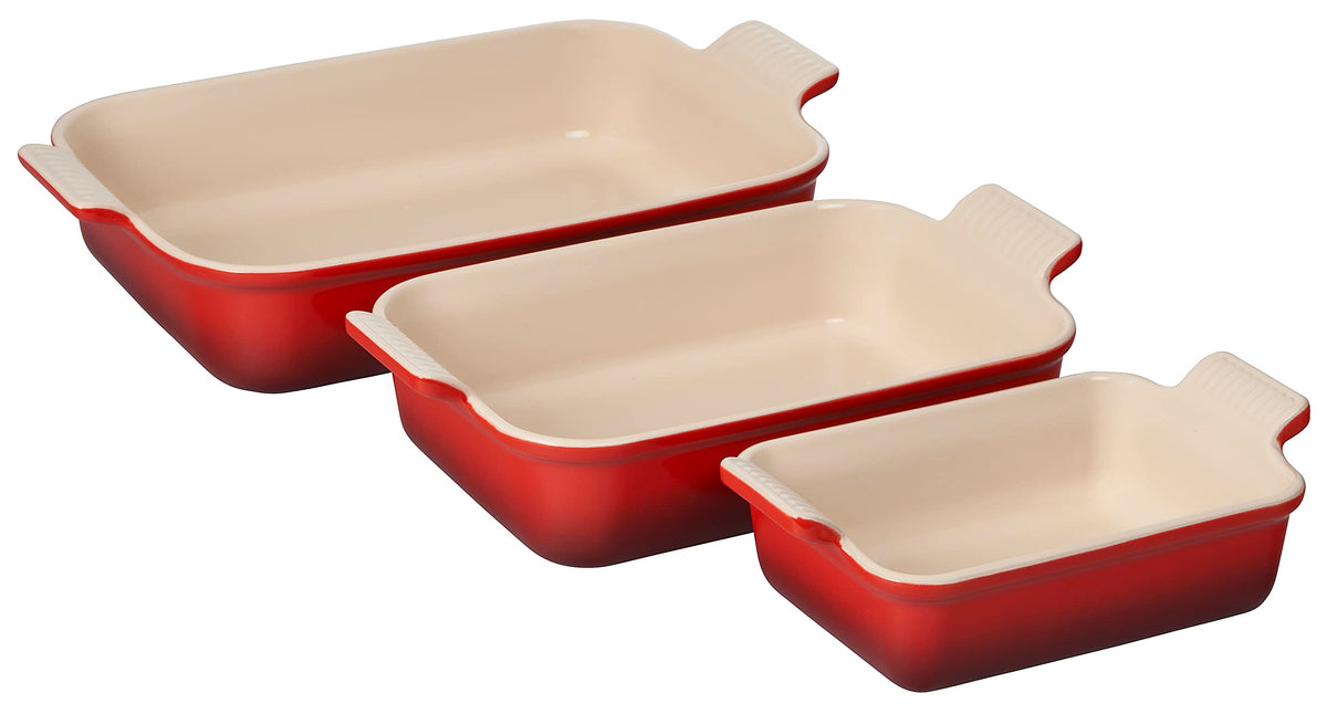 Le Creuset Heritage stoneware 12.5-inch rectangular dish in cerise, even baking and easy release.