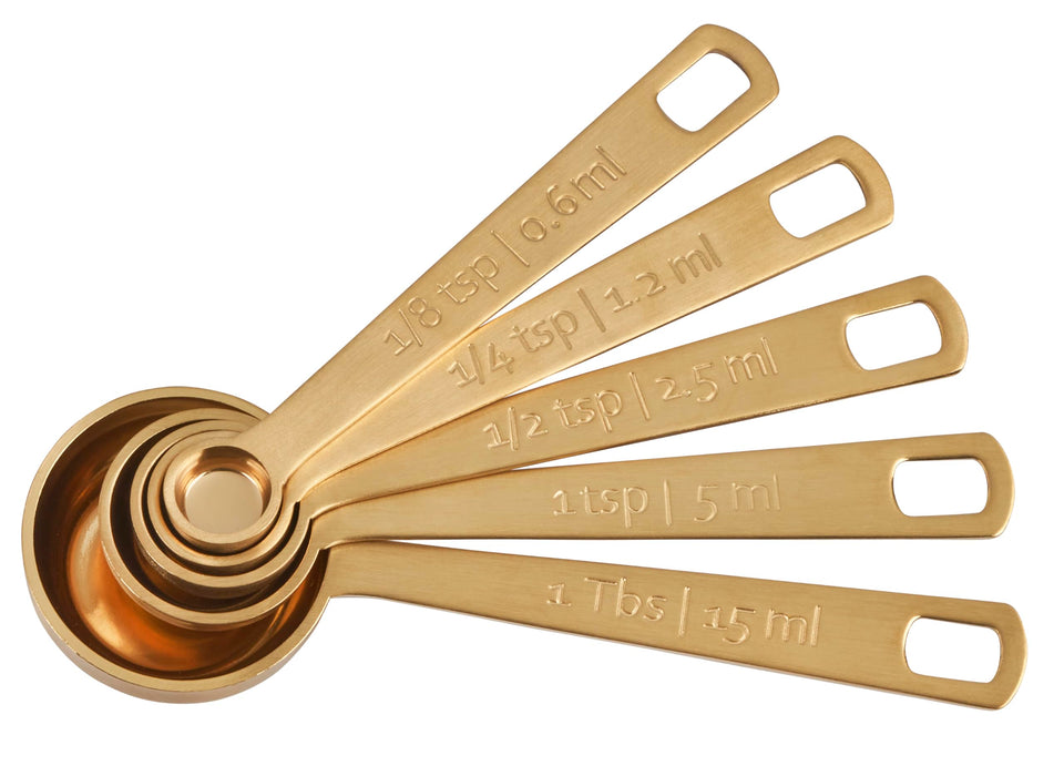 Le Creuset gold measuring spoon 1/8 tsp for precise seasoning in daily cooking