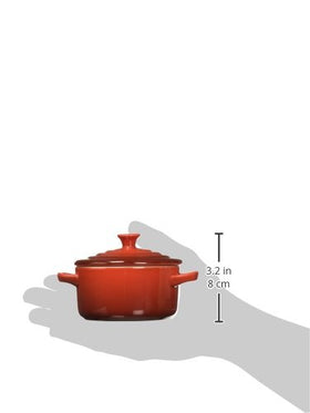 Le Creuset Cerise cocotte on table, serving-ready presentation