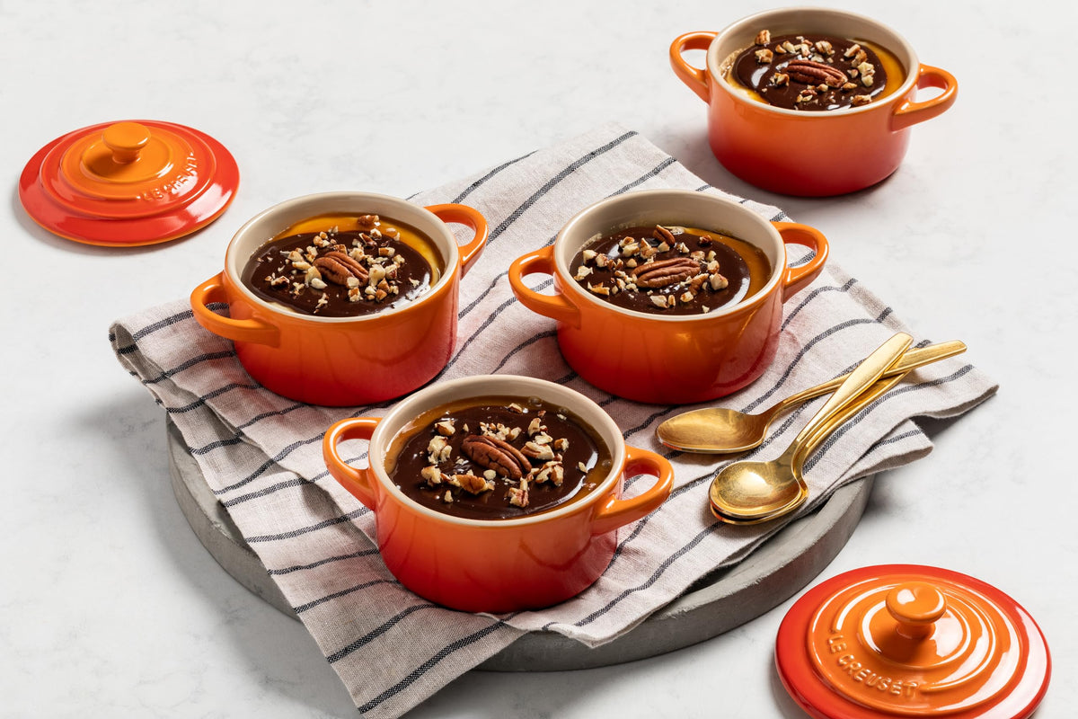Le Creuset Mini Round Cocotte 8oz Flame, oven-ready for quick personal bakes.