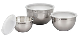 Le Creuset nested mixing bowls set, three sizes, ideal for prep, mixing, and storage.