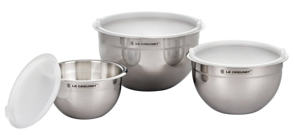 Le Creuset nested mixing bowls set, three sizes, ideal for prep, mixing, and storage.