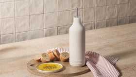 Le Creuset stoneware cruet with 20-oz capacity for oils and vinegars
