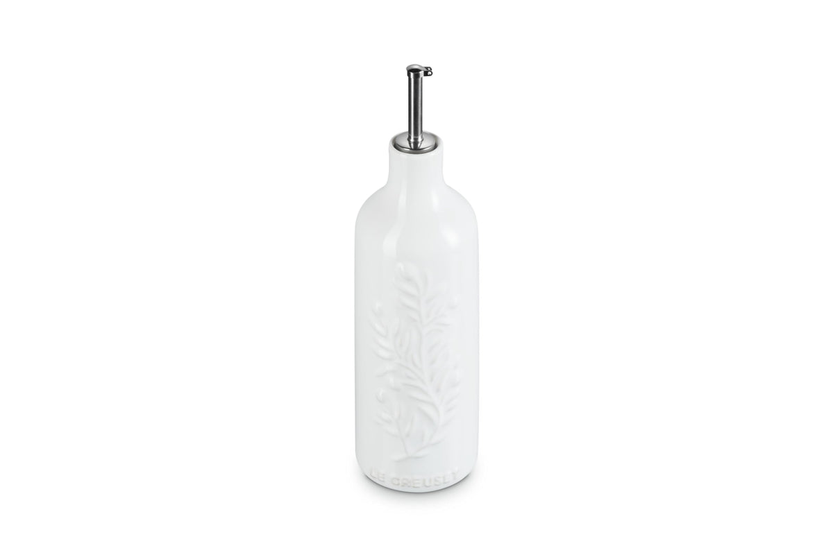 Le Creuset Olive Branch Oil Cruet with anti-drip nozzle for precise pouring.