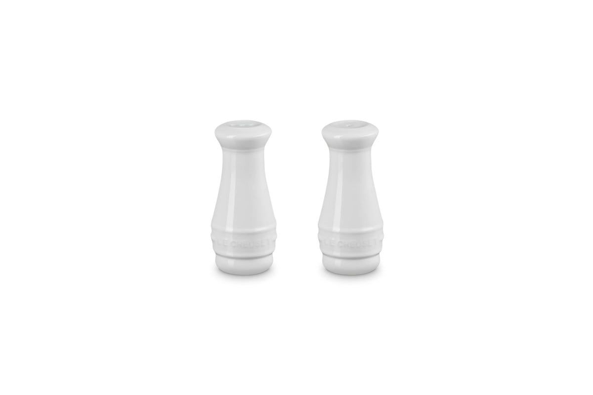 Le Creuset salt and pepper shakers front view with durable enamel finish resisting odors.