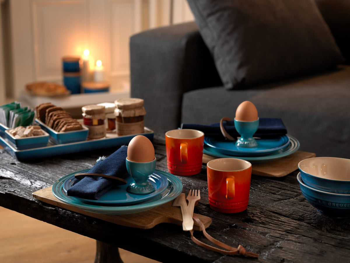 Le Creuset egg cup used for desserts or herbs, showcasing versatile serving.