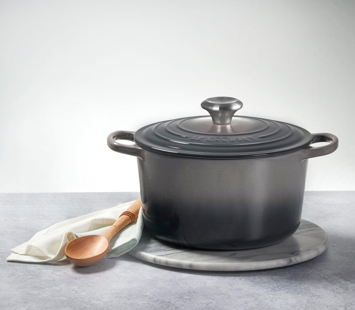 Stovetop scene with simmering stew demonstrates versatile cooking capabilities