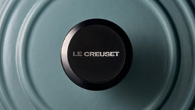 Le Creuset Signature Large Knob on cookware during oven use, easy to grip.