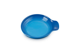 Le Creuset Signature Spoon Rest Marseille 6in on table for mess-free meals