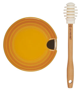 Le Creuset Nectar honey pot with silicone dipper, easy release for quick cleanup.