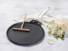 Le Creuset pan on the stove illustrating universal cooktop compatibility