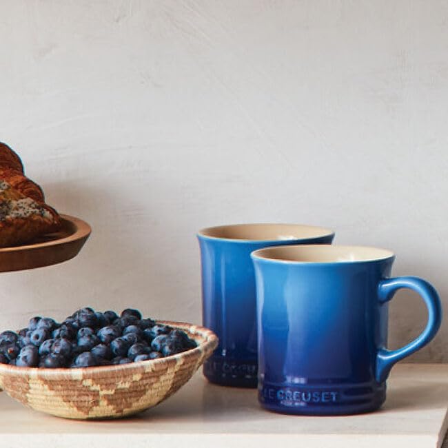 Le Creuset Vancouver Mug Peche, in-use with coffee, perfect for everyday hot drinks.