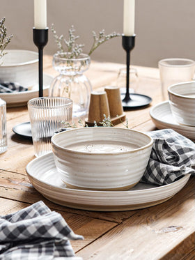 LE TAUCI bowls with muted glaze and natural texture for rustic dining.
