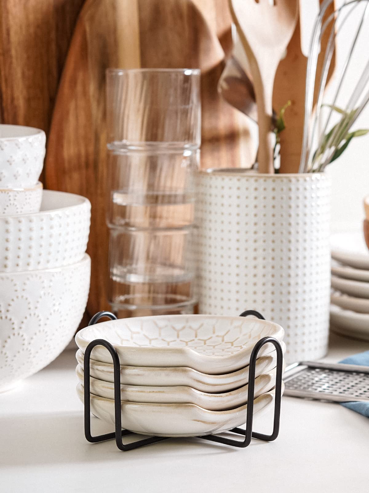 LE TAUCI ceramic spoon rest shown with metal holder for vertical storage