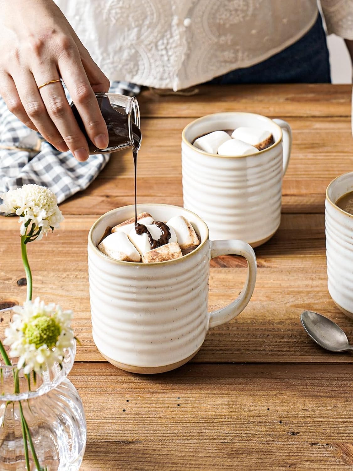 LE TAUCI unglazed bottom shows natural clay texture on each mug
