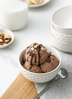 LE TAUCI embossed ceramic bowls show pattern outside for stylish entertaining.