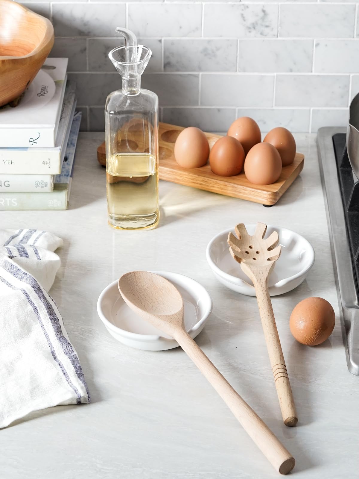 LE TAUCI ceramic rest stacks neatly beside the stove.