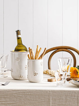 LE TAUCI multipurpose ceramic jar doubles as a vase or desk organizer.