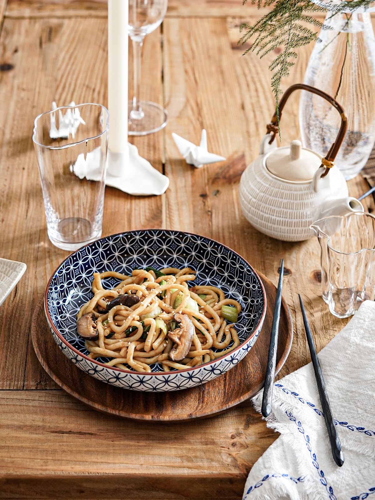 LE TAUCI pasta bowl close-up with brick red rim adds artisanal warmth.