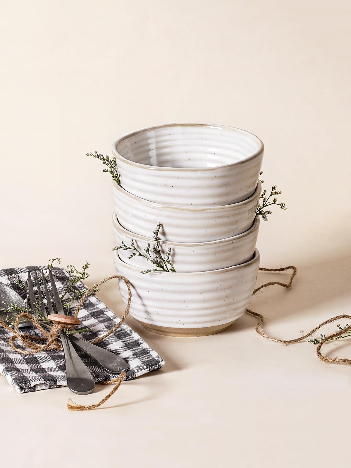 LE TAUCI stackable bowls save space in compact kitchen cabinets.