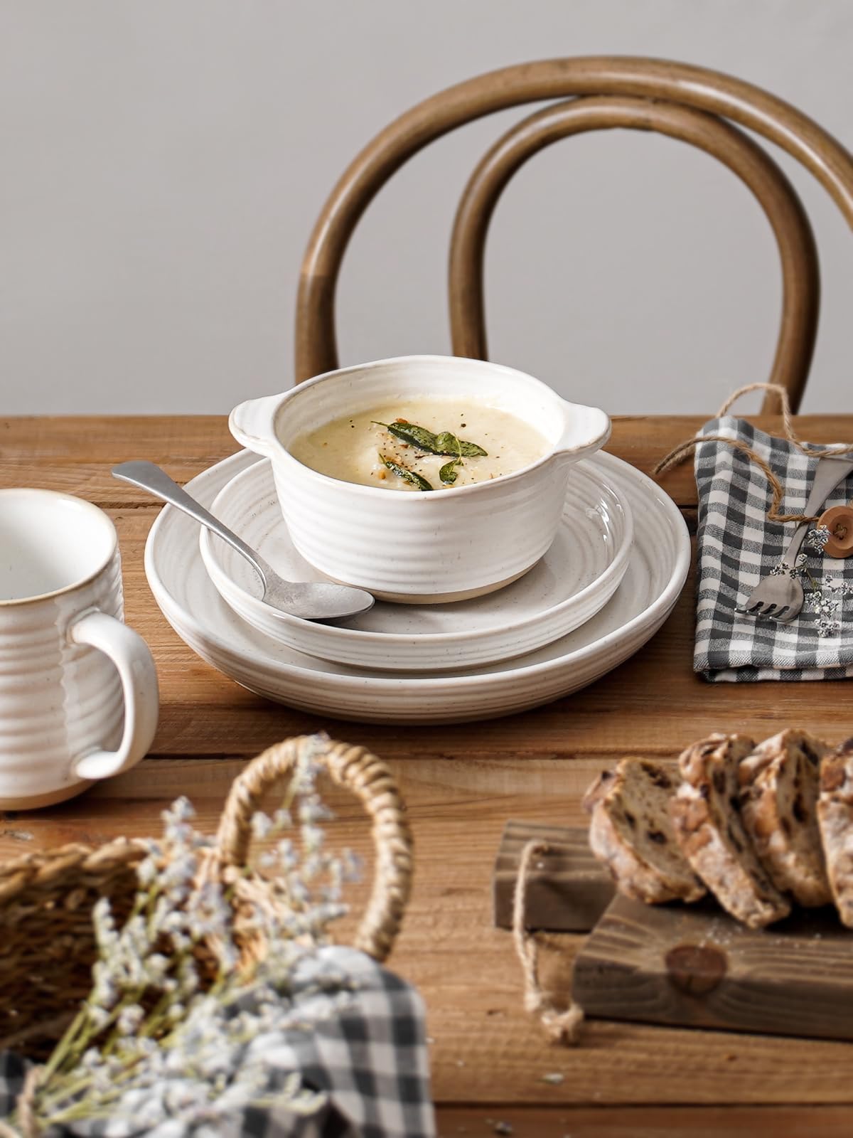 LE TAUCI raw clay base adds natural charm to the table