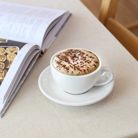 Thick-walled ceramic insulates to keep drinks warm.