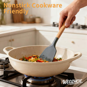Lecakolma slotted spoon in gray protects cookware while serving.