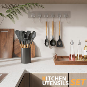 Lecakolma slotted turner gray protects nonstick surfaces during turning.
