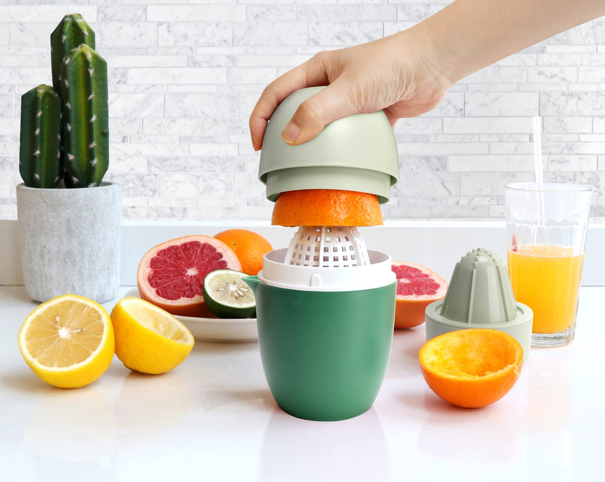 Lechin Hand Juicer in vibrant green adds kitchen style.